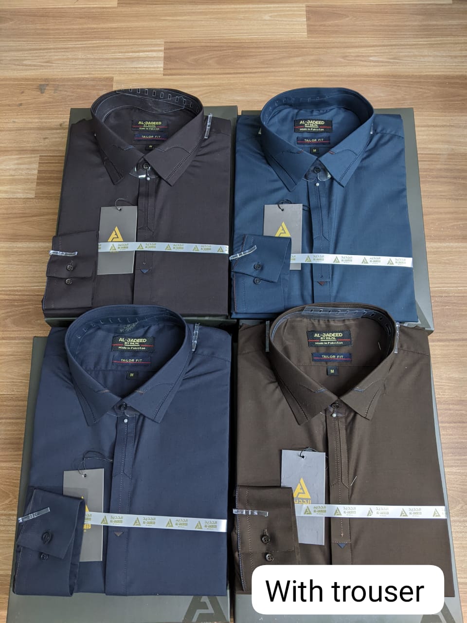 Kameez with trousers. Available in black , blue and brown